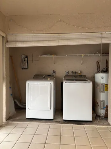 a utility room with a washer and dryer