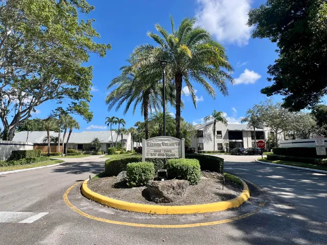 a building with trees in front of it