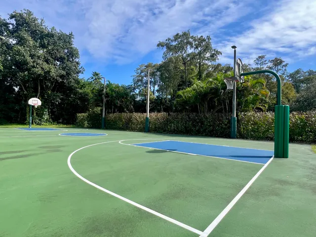 a view of a terrace with wooden floor and a lake view