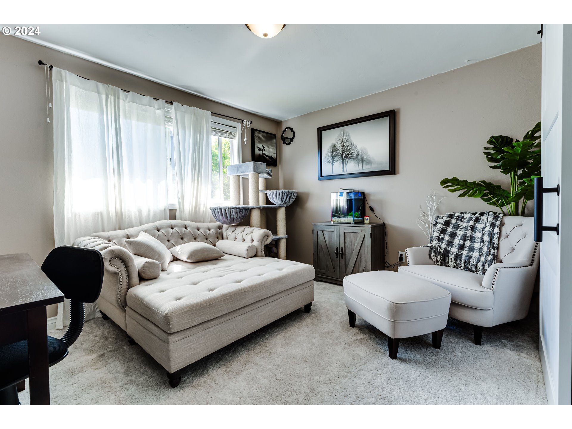 2288 9th Street Springfield, OR 97477 - Photo 25 of 41 a living room with furniture and a large window