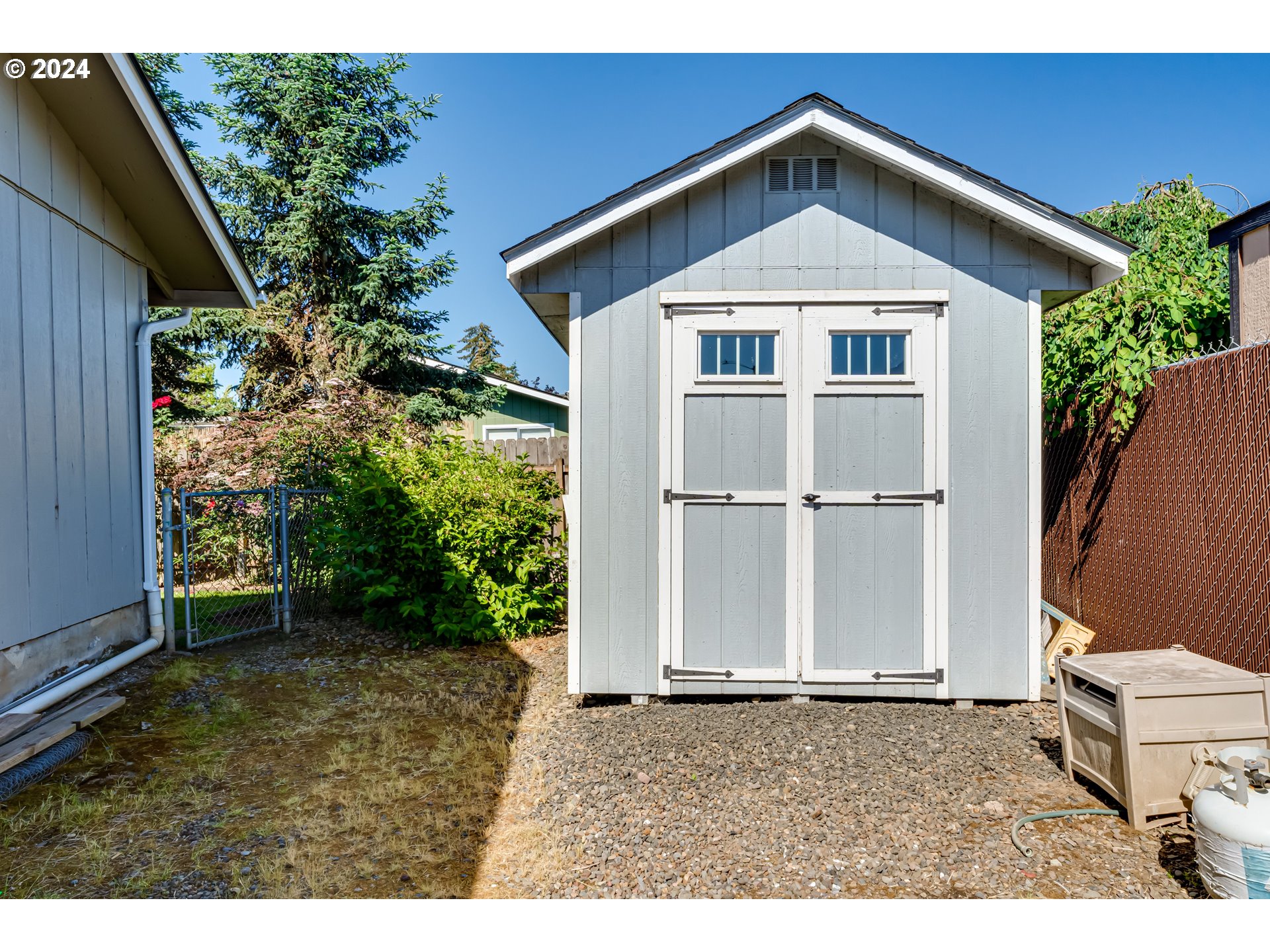 2288 9th Street Springfield, OR 97477 - Photo 41 of 41 a front view of a house with a yard