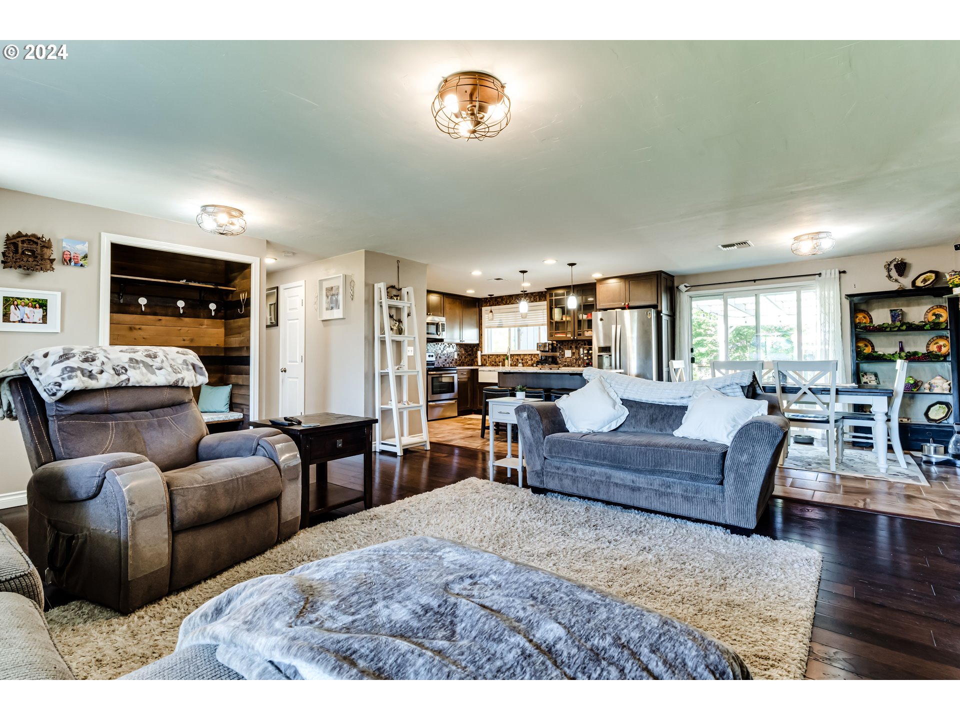 2288 9th Street Springfield, OR 97477 - Photo 8 of 41 a living room with furniture and a wooden floor