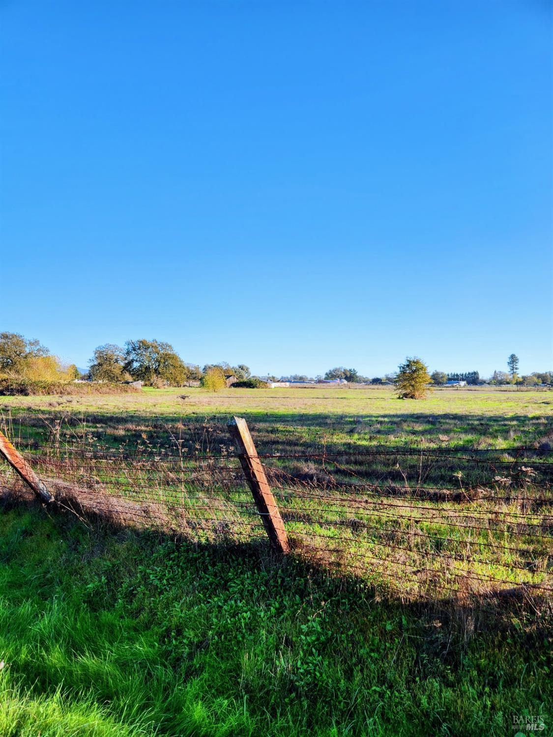 3988 Pyle Avenue Santa Rosa, CA 95407 - Photo 6 of 12 a view of a lake with a mountain in the background