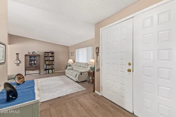 a bed room with a bed and furniture