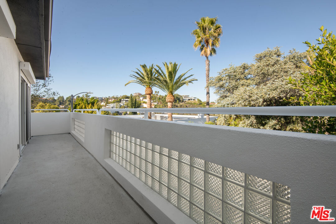1001 Stradella Road Los Angeles, CA 90077 - Photo 20 of 28 a view of balcony with a potted plant