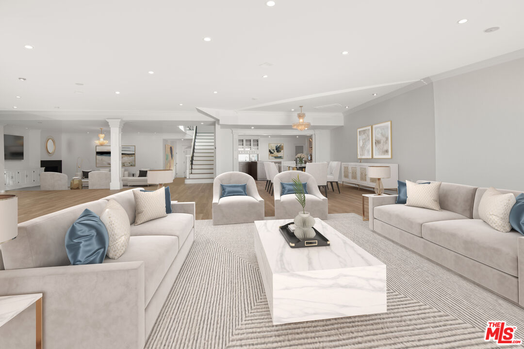 1001 Stradella Road Los Angeles, CA 90077 - Photo 4 of 28 a living room with furniture white walls and white walls