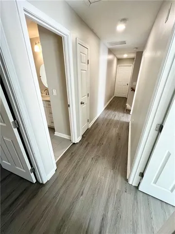 a view of entryway with wooden floor
