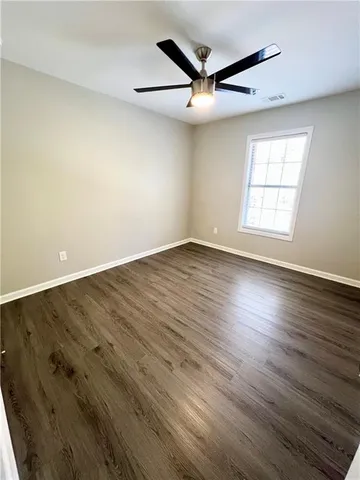 a view of a backyard of the house