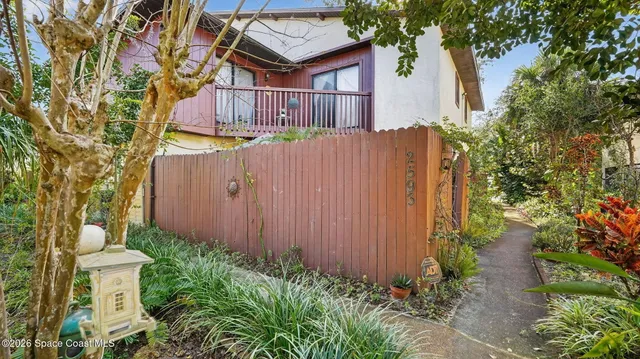a outdoor seating area with furniture and garden