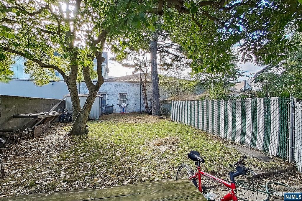 42 Grand Street Garfield, NJ 07026 - Photo 7 of 26 a view of outdoor space and garden