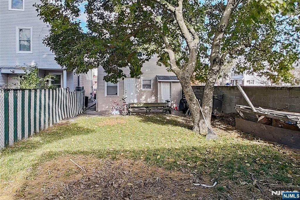 42 Grand Street Garfield, NJ 07026 - Photo 8 of 26 a view of a house with backyard