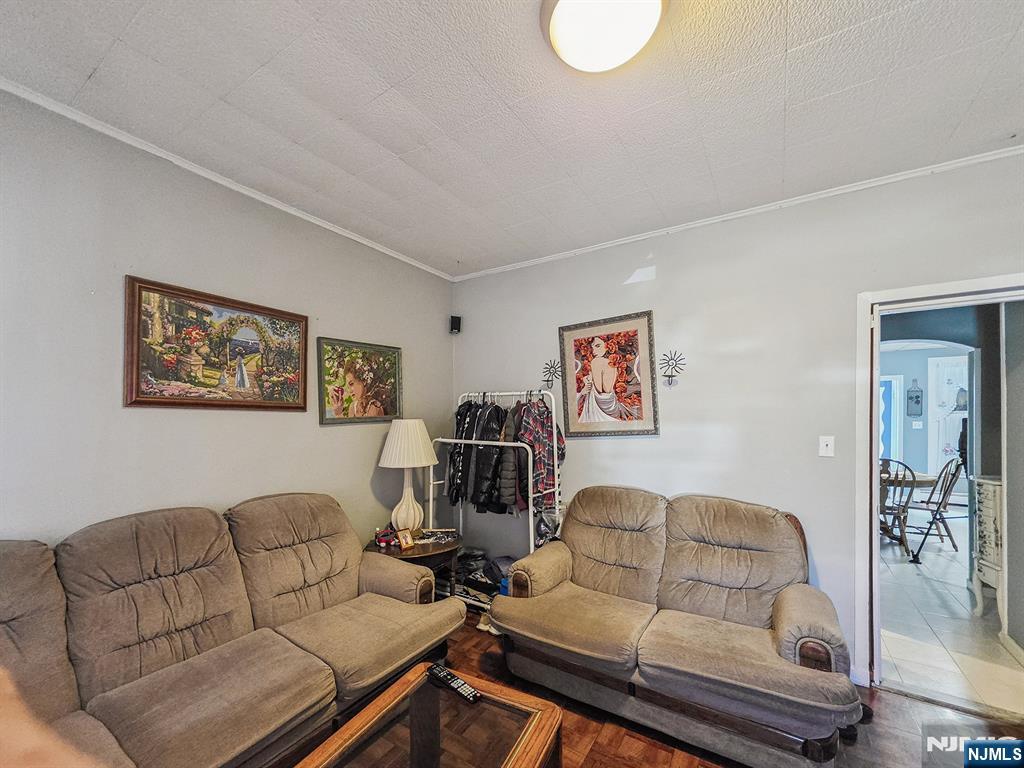 42 Grand Street Garfield, NJ 07026 - Photo 10 of 26 a living room with furniture