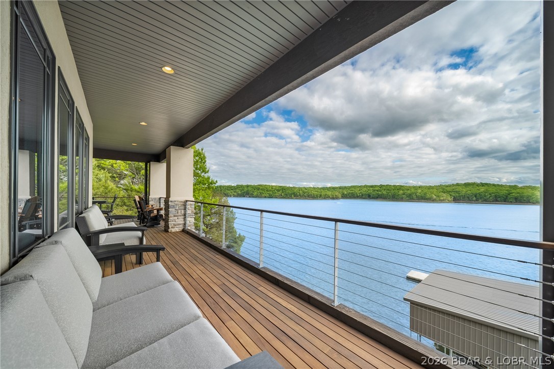 777 Malibu Road Osage Beach, MO 65065 - Photo 44 of 100 Designed for all day enjoyment the covered deck pr