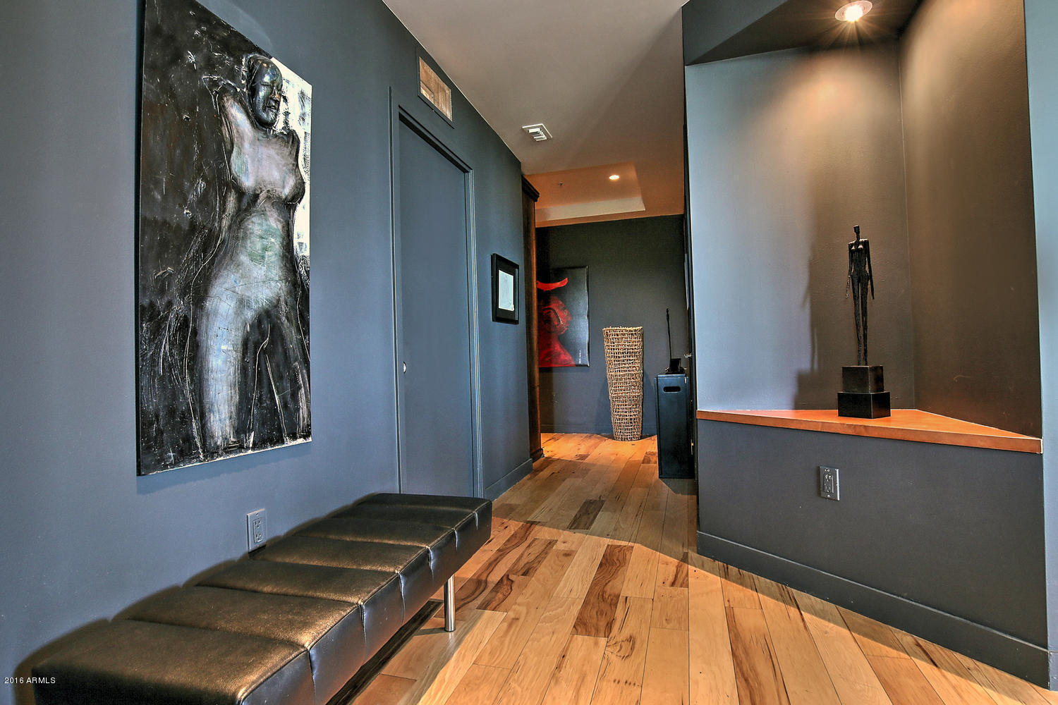 208 West Portland Street, Unit 460 Phoenix, AZ 85003 - Photo 3 of 37 a bed room with a bed and a window