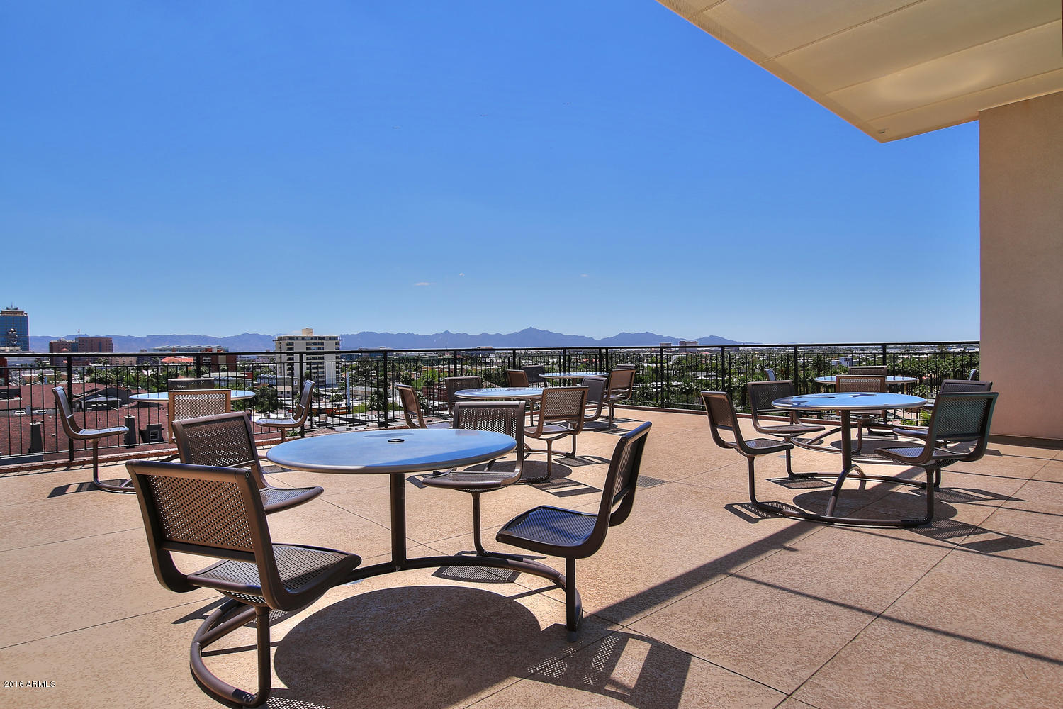 208 West Portland Street, Unit 460 Phoenix, AZ 85003 - Photo 31 of 37 a view of a terrace with furniture