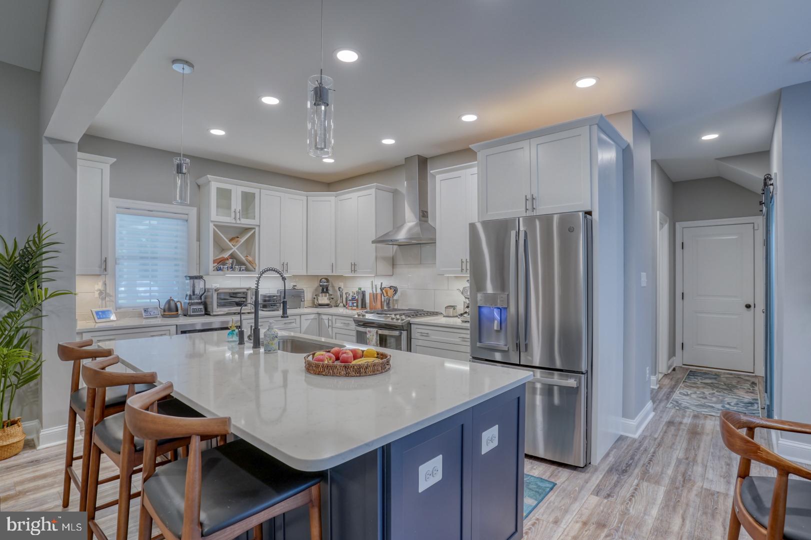 4 Rivers End Drive Seaford, DE 19973 - Photo 11 of 38 a kitchen with stainless steel appliances granite countertop counter space a sink refrigerator and cabinets