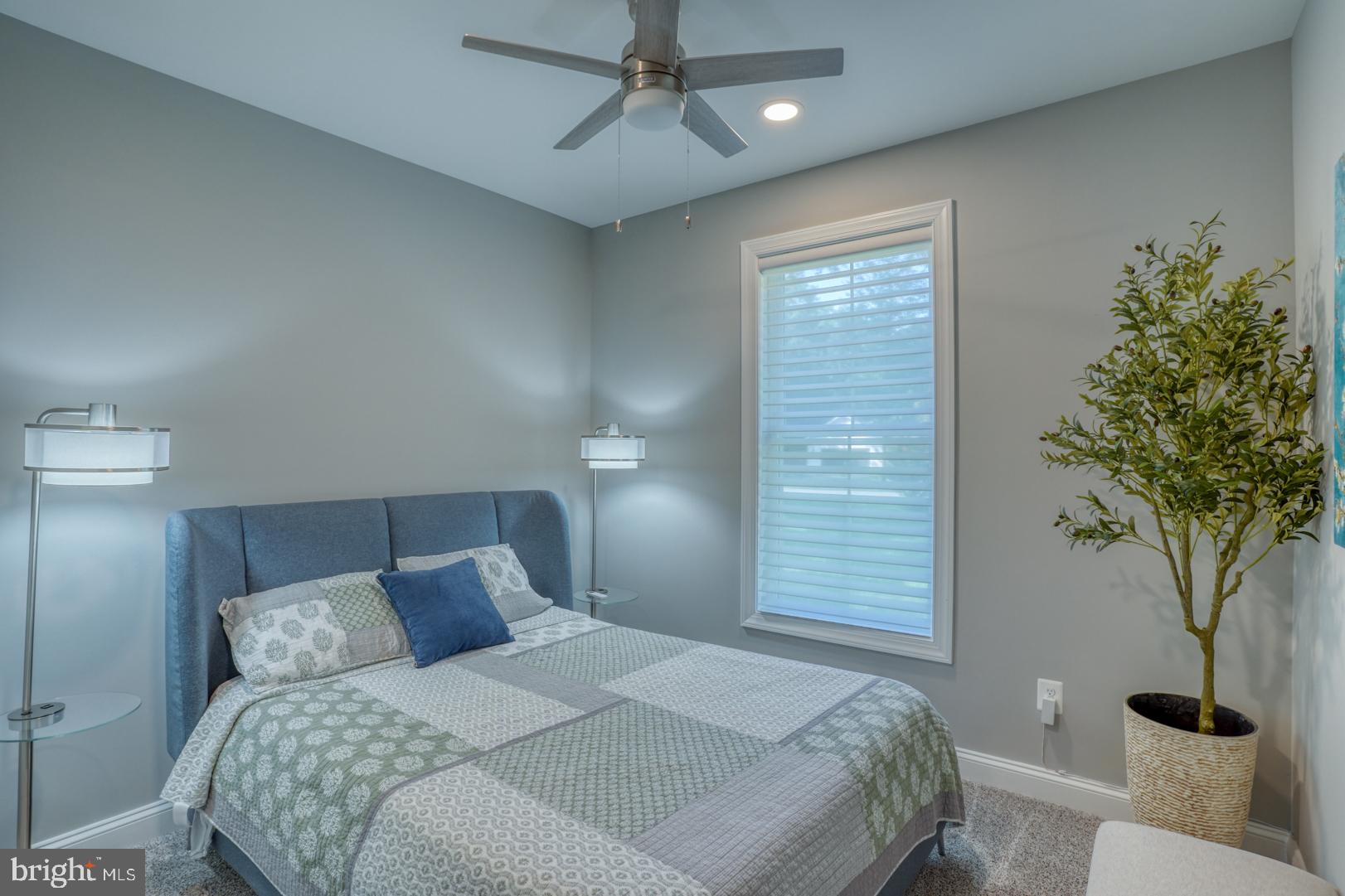 4 Rivers End Drive Seaford, DE 19973 - Photo 20 of 38 a bedroom with a bed and a tree
