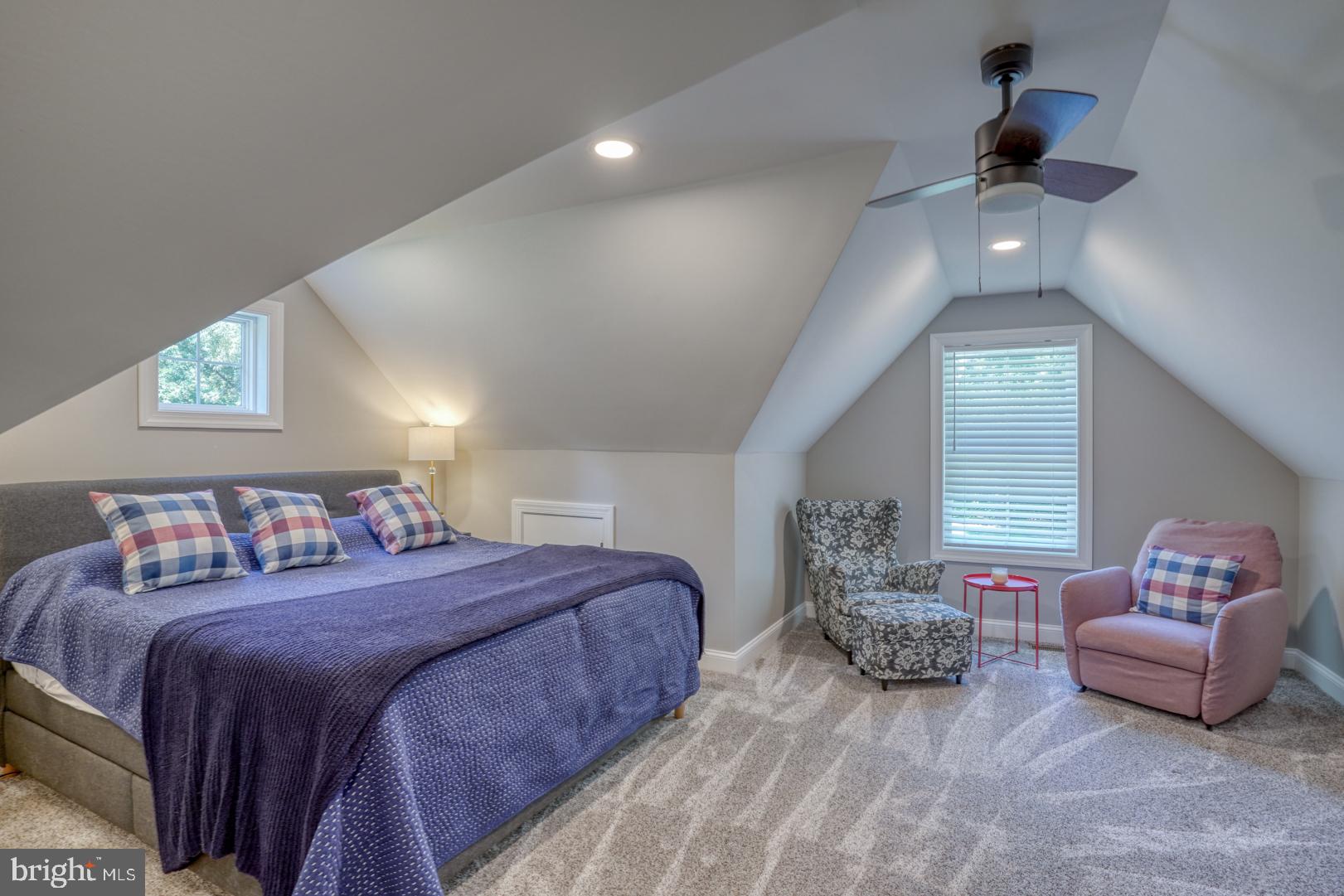 4 Rivers End Drive Seaford, DE 19973 - Photo 25 of 38 a spacious bedroom with two beds and a chandelier