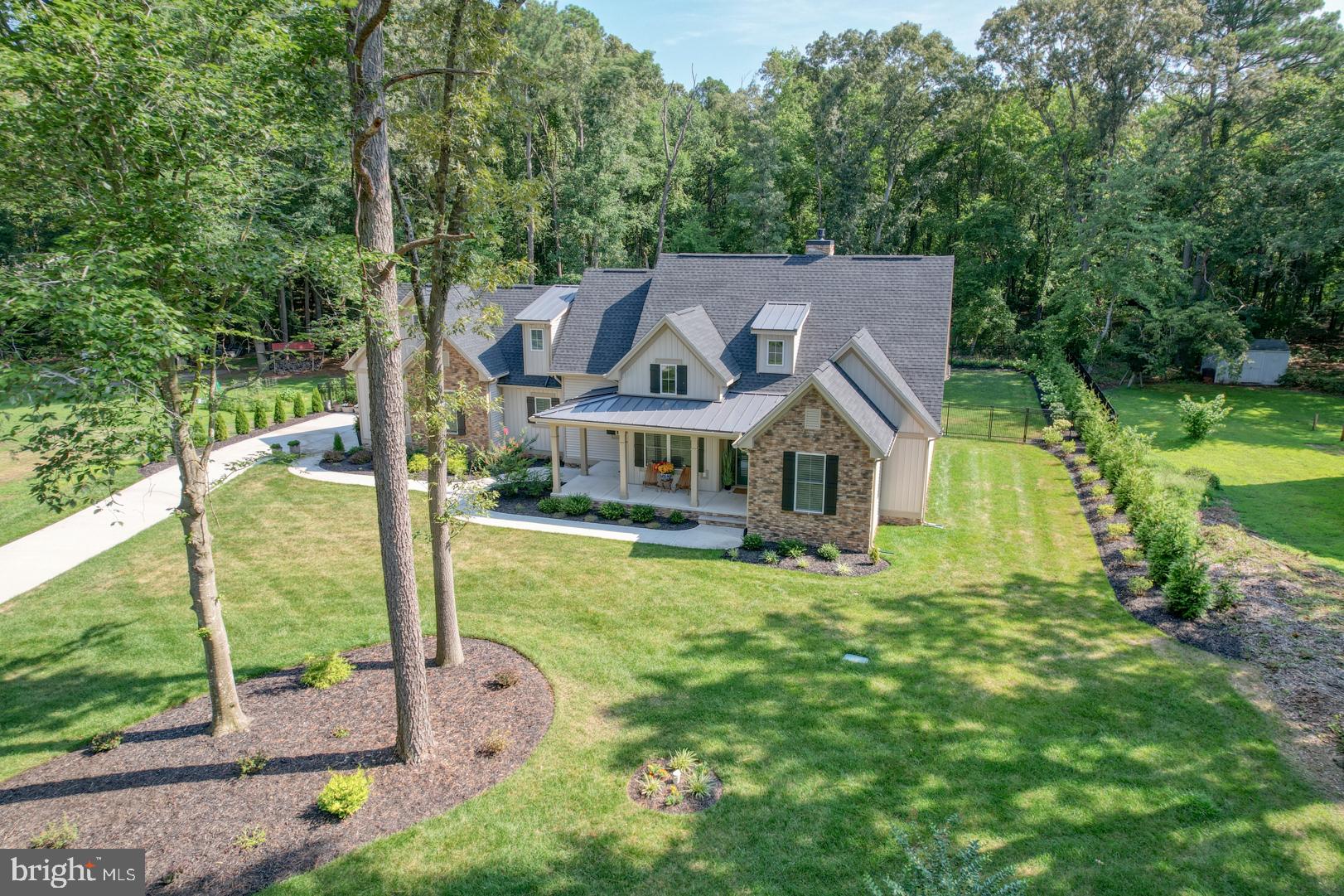 4 Rivers End Drive Seaford, DE 19973 - Photo 3 of 38 a house view with a garden space