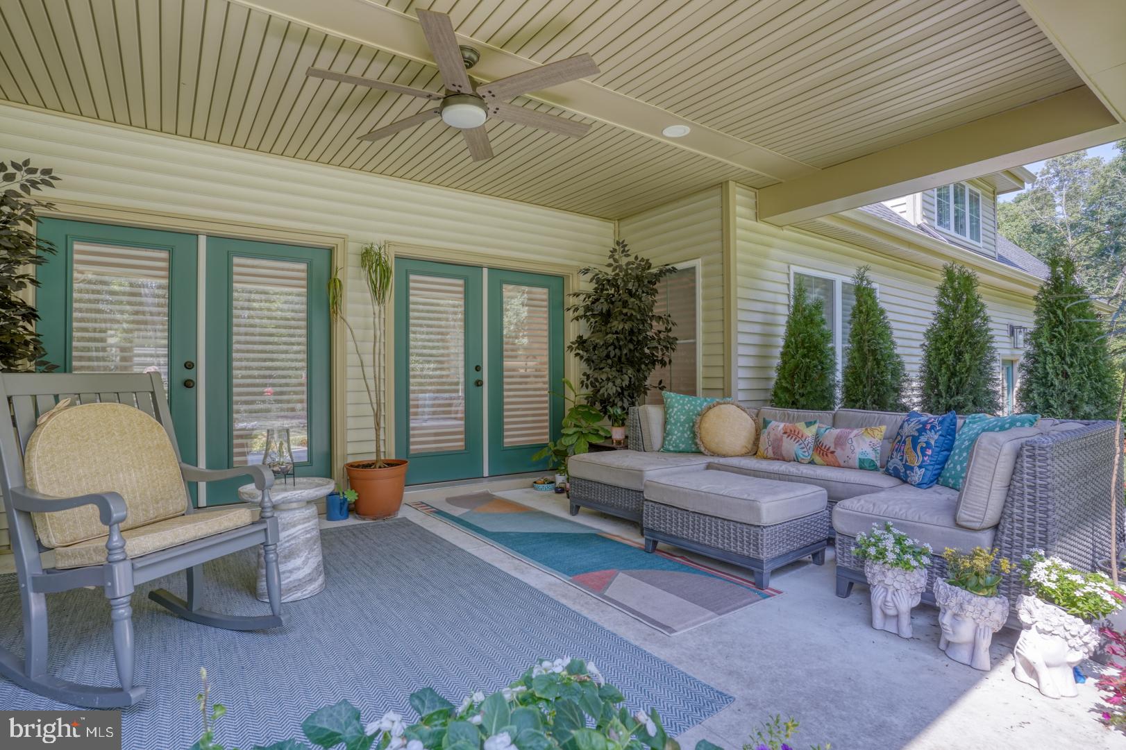 4 Rivers End Drive Seaford, DE 19973 - Photo 31 of 38 a outdoor living space with furniture and a potted plant