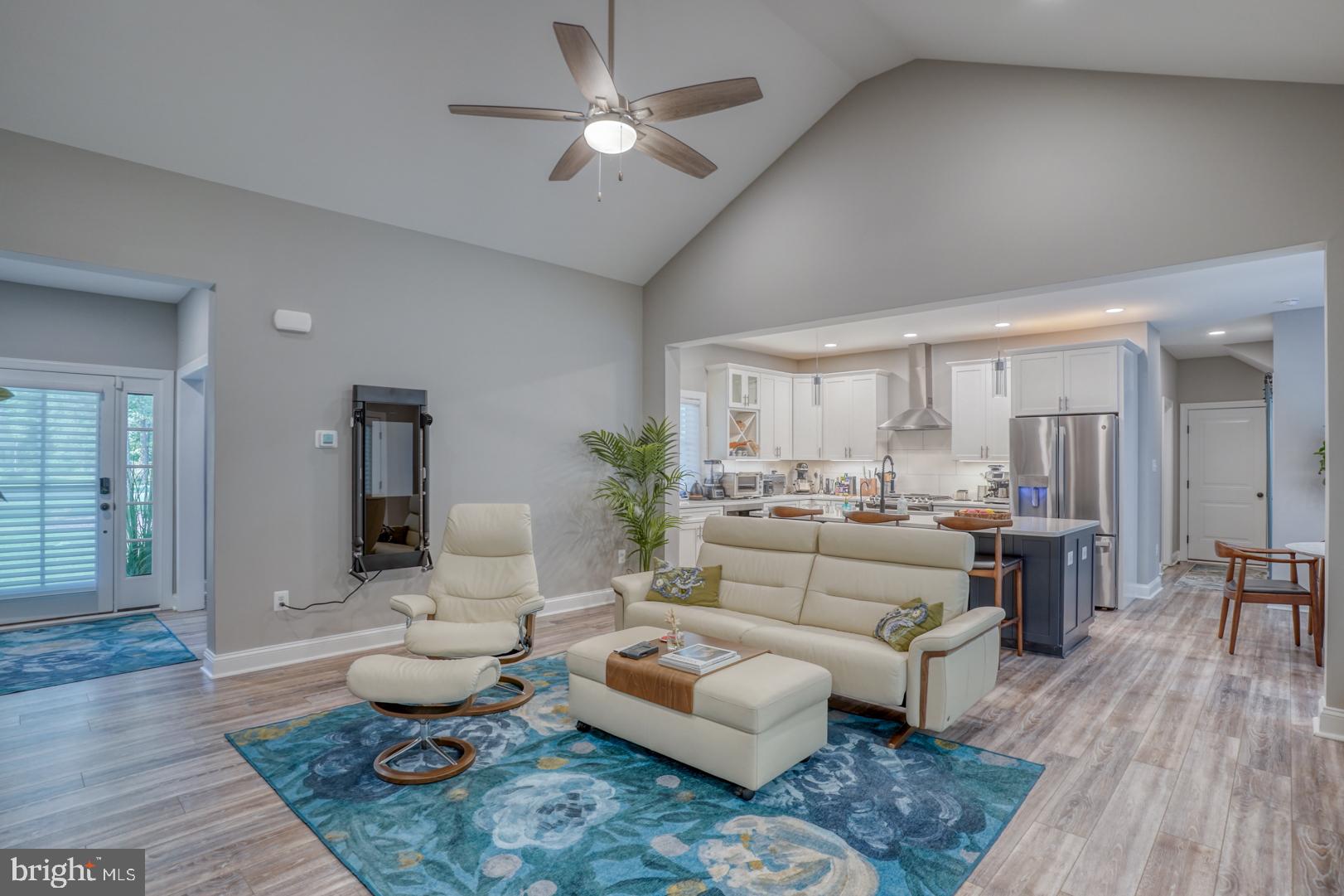 4 Rivers End Drive Seaford, DE 19973 - Photo 38 of 38 a living room with furniture a rug and a chandelier