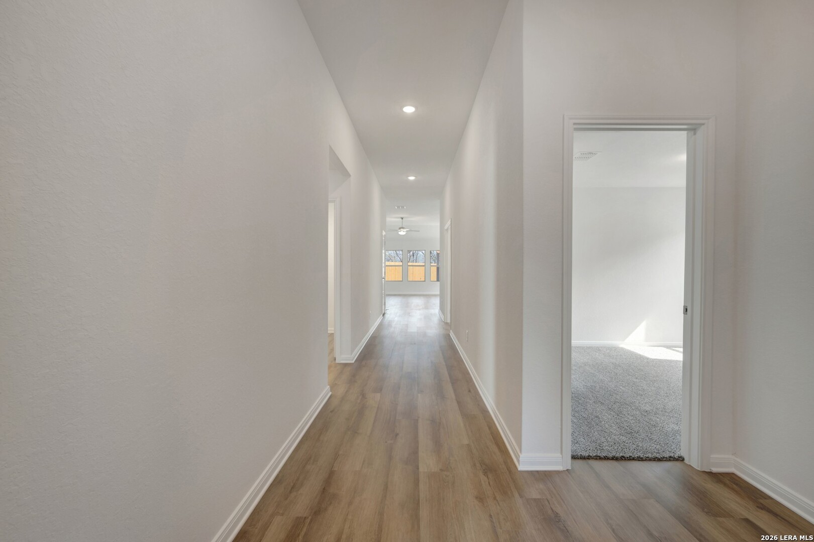 2829 Sun Bayou Seguin, TX 78155 - Photo 16 of 45 a view of a hallway with wooden floor