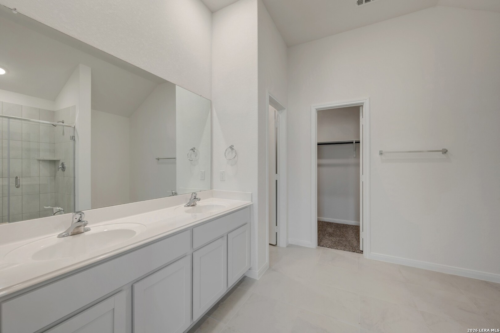 2829 Sun Bayou Seguin, TX 78155 - Photo 22 of 45 a bathroom with a double vanity sink and mirror