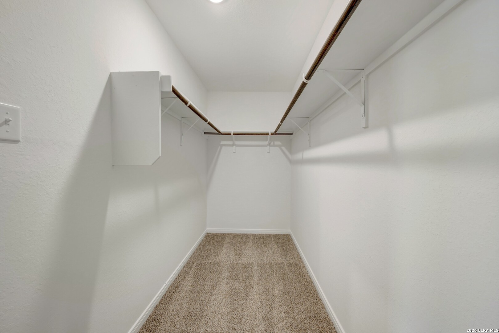2829 Sun Bayou Seguin, TX 78155 - Photo 26 of 45 a view of a hallway with wooden floor