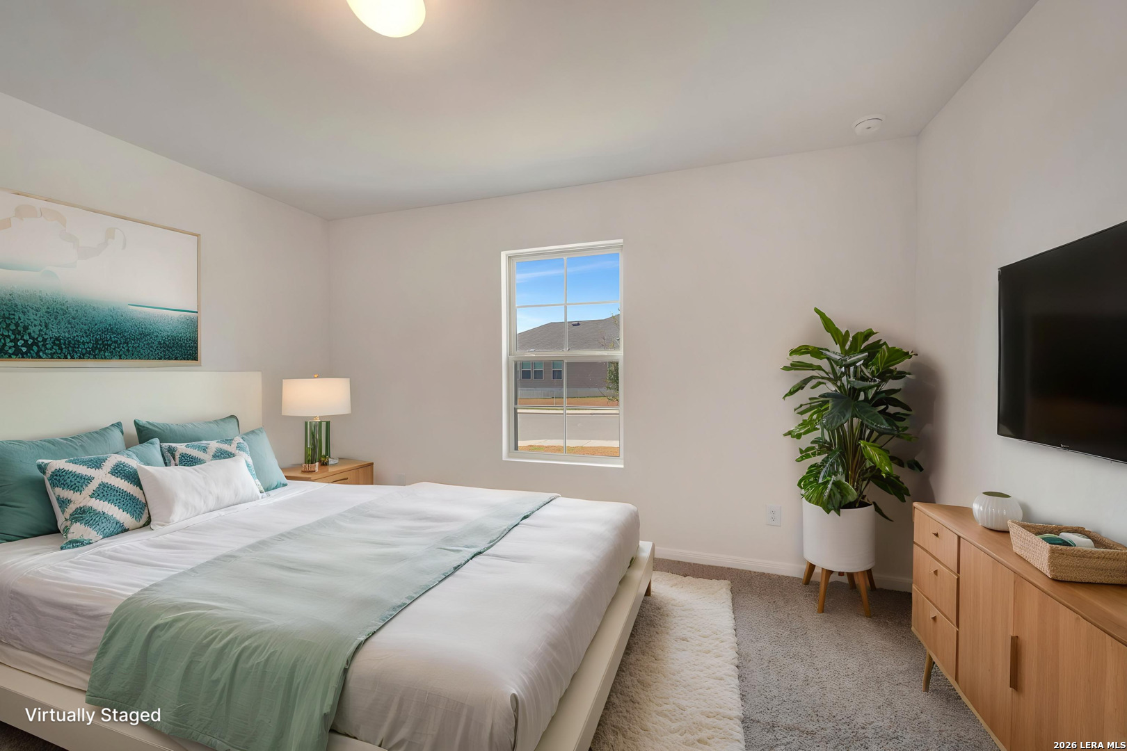 2829 Sun Bayou Seguin, TX 78155 - Photo 27 of 45 a bedroom with a bed and a potted plant