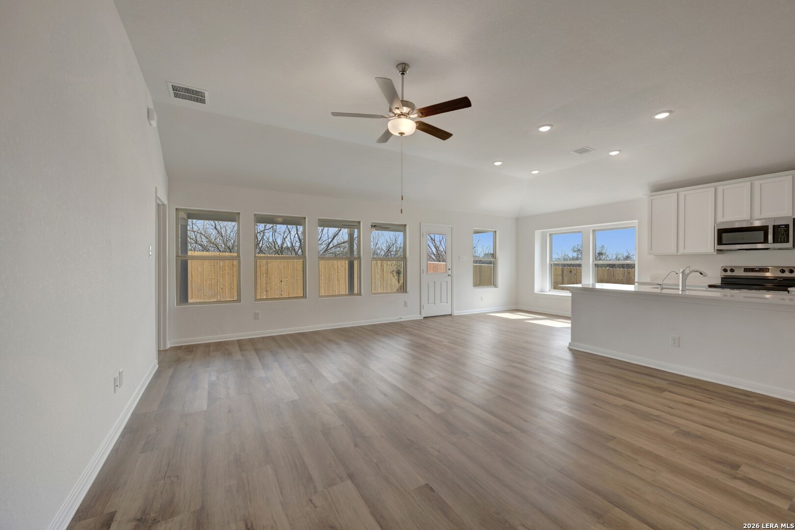 2829 Sun Bayou Seguin, TX 78155 - Photo 10 of 45 a view of kitchen and hall with wooden floor