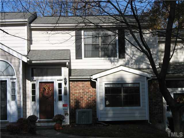 2406 Condor Court Raleigh, NC 27615 - Photo 1 of 16 a front view of a house with parking