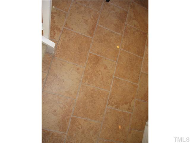2406 Condor Court Raleigh, NC 27615 - Photo 3 of 16 a bathroom with a shower