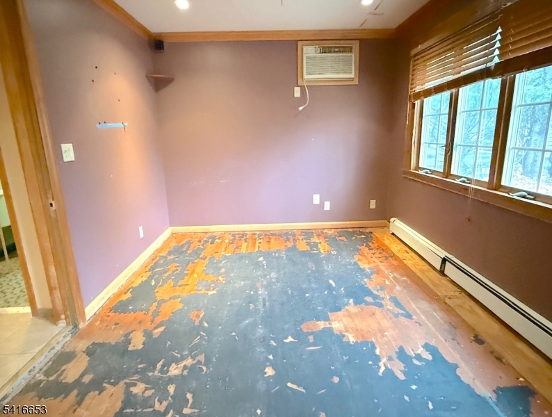34 Howard Street Verona, NJ 07044 - Photo 12 of 20 a view of an empty room and window