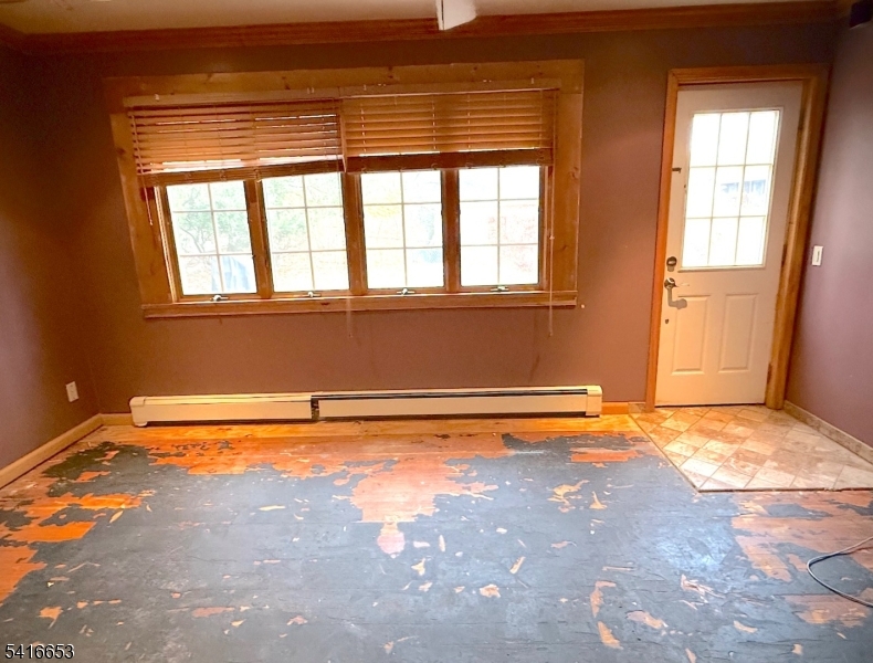 34 Howard Street Verona, NJ 07044 - Photo 13 of 20 a view of an empty room with a window
