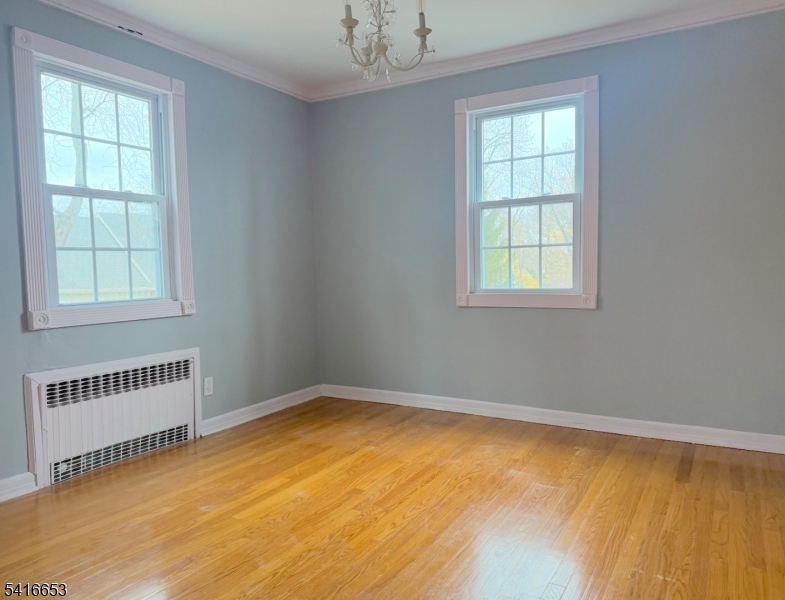 34 Howard Street Verona, NJ 07044 - Photo 14 of 20 an empty room with a window