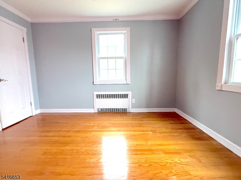 34 Howard Street Verona, NJ 07044 - Photo 15 of 20 a view of an empty room with a window