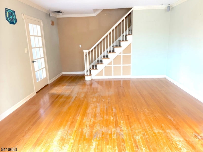 34 Howard Street Verona, NJ 07044 - Photo 4 of 20 a view of entryway with wooden floor
