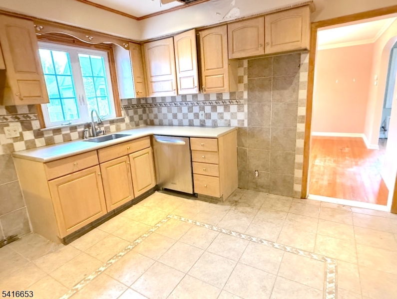 34 Howard Street Verona, NJ 07044 - Photo 8 of 20 a bathroom with a granite countertop sink and mirror