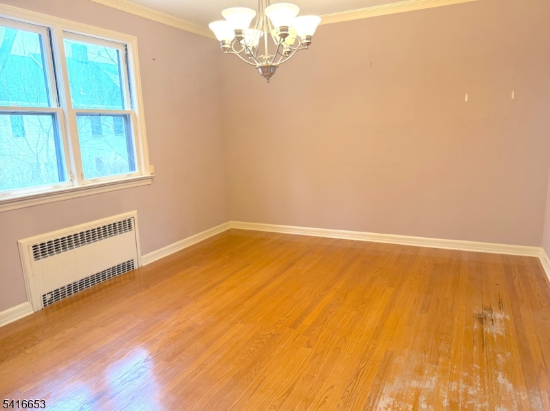 34 Howard Street Verona, NJ 07044 - Photo 10 of 20 a view of an empty room with a window