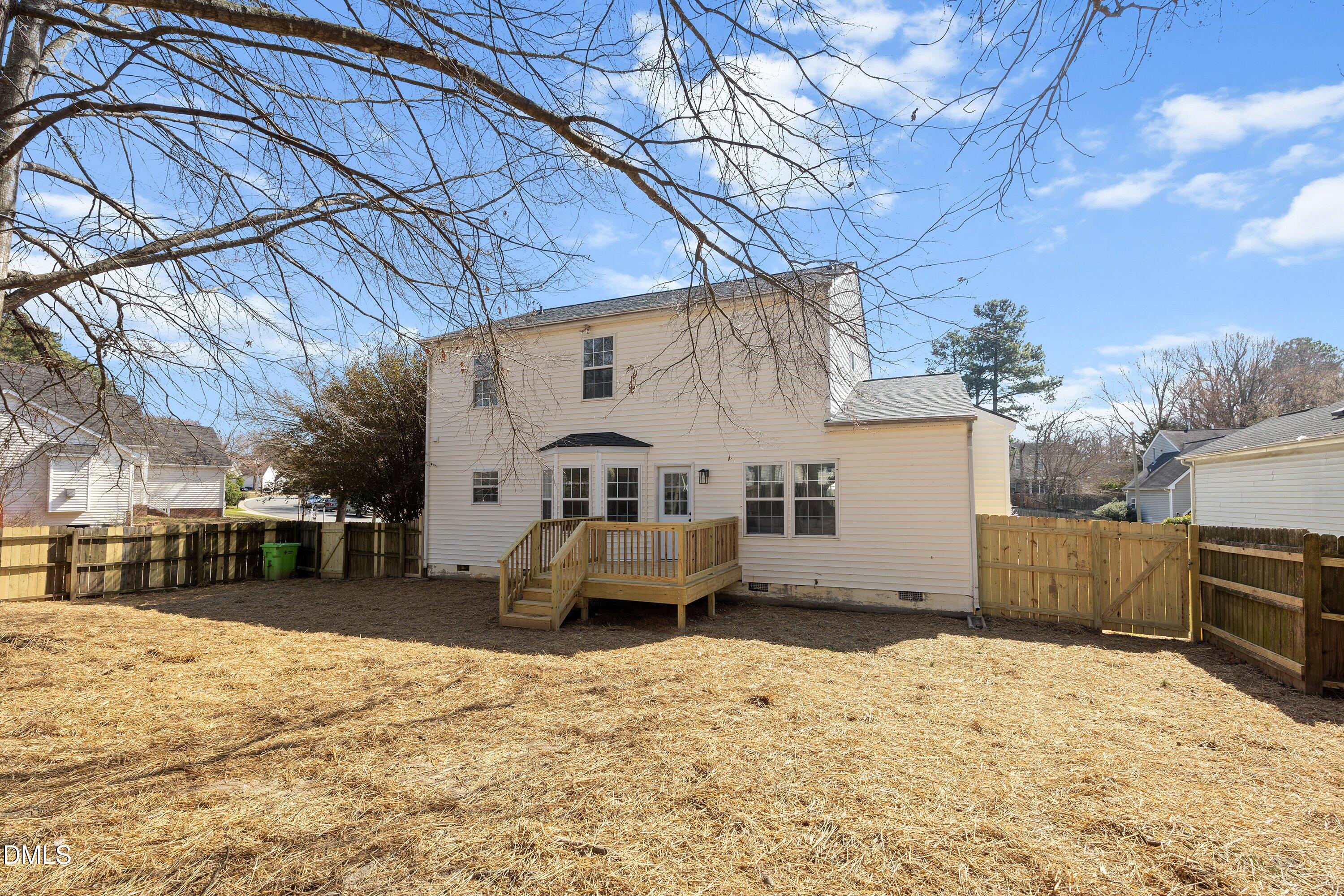 4219 Mantua Way Raleigh, NC 27604 - Photo 42 of 44 a view of a house with a yard covered in snow