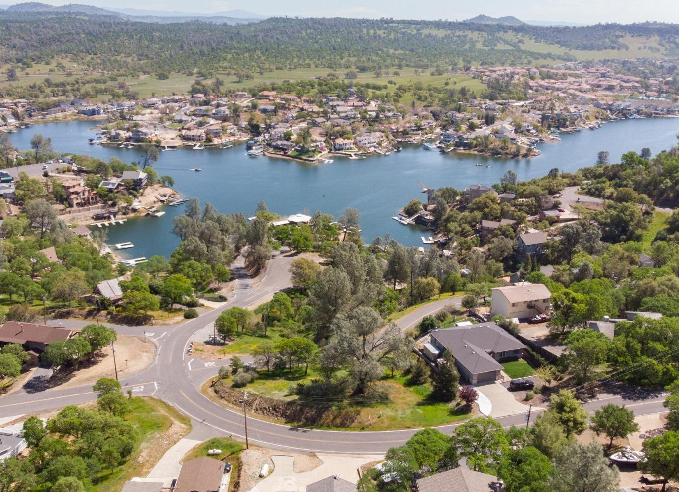 4314 Edgewater Court Copperopolis, CA 95228 - Photo 8 of 13 an aerial view of ocean and residential houses with outdoor space