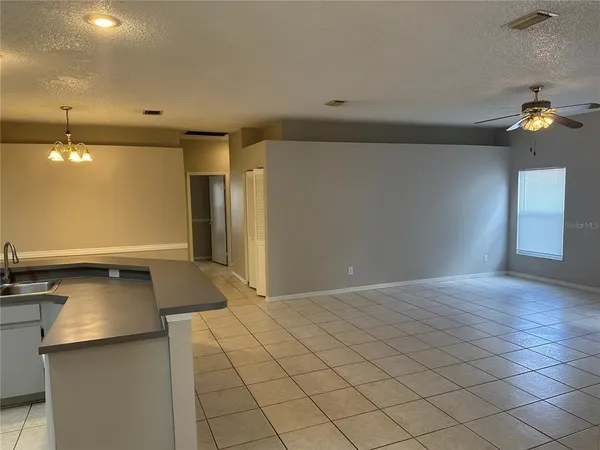 a view of a kitchen with a sink