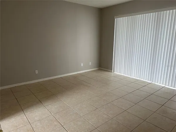 an empty room with a bench