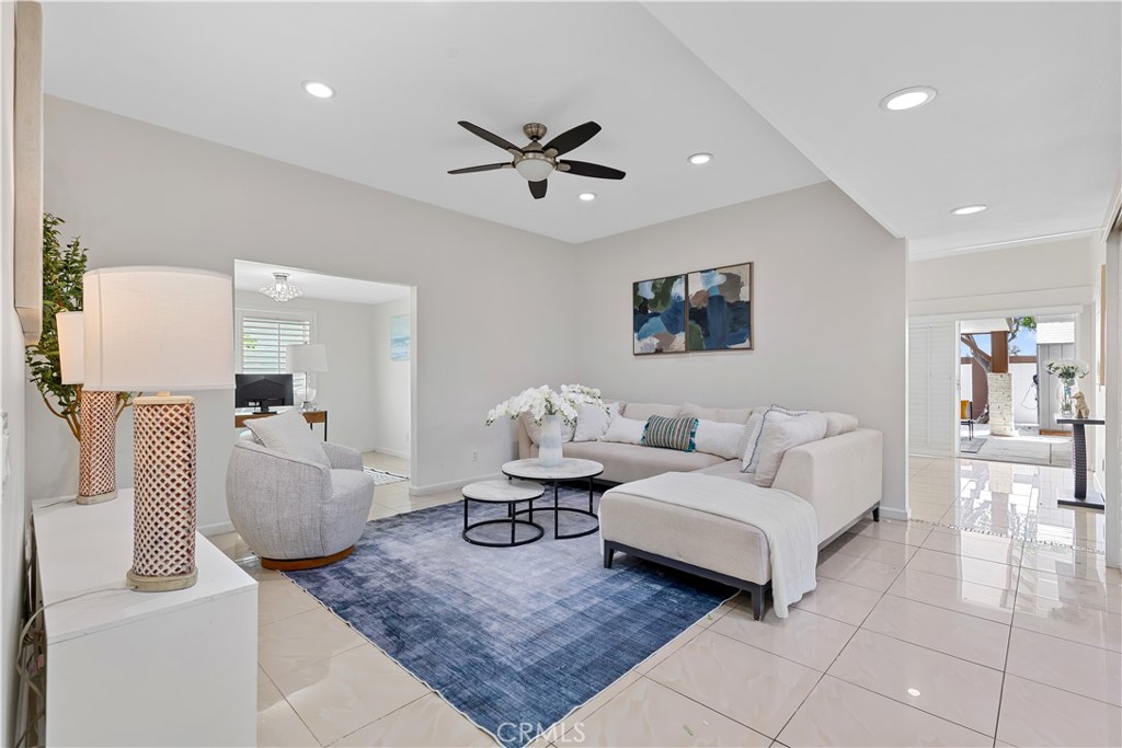 14332 Kipling Lane Tustin, CA 92780 - Photo 11 of 16 a living room with furniture and a rug