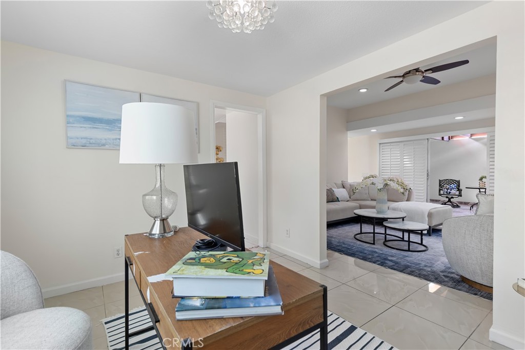 14332 Kipling Lane Tustin, CA 92780 - Photo 13 of 16 a living room with furniture and a table