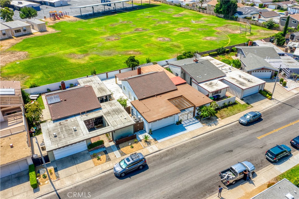 14332 Kipling Lane Tustin, CA 92780 - Photo 2 of 16 an aerial view of residential houses with outdoor space