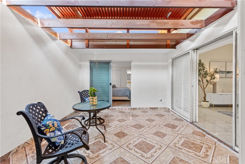 14332 Kipling Lane Tustin, CA 92780 - Photo 8 of 16 a living room with furniture and a table