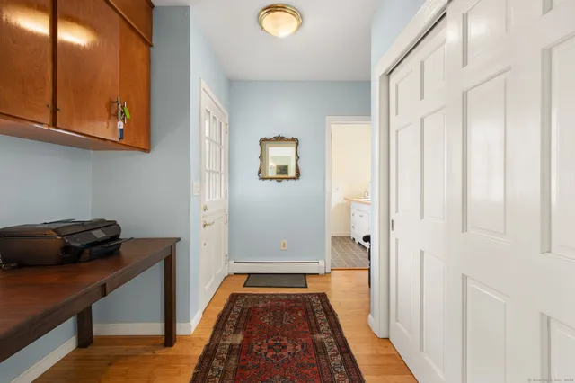 a view of a hallway and interior of the house