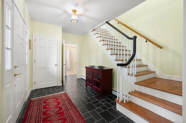 a view of entryway with a rug
