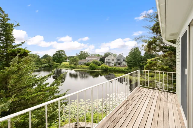 a view of a balcony with lake view
